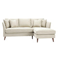 Moderne hoekbank met kussens in lichtbeige stof